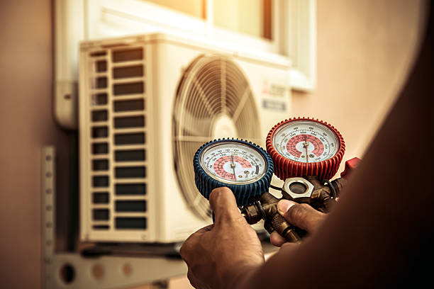Professional Air Conditioning Service technician working in Buena Vista, TN